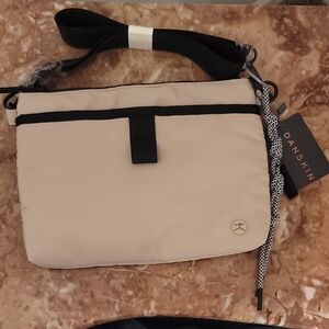 Danskin Zora Crossbody Taupe Bag  Black Trim + Strap